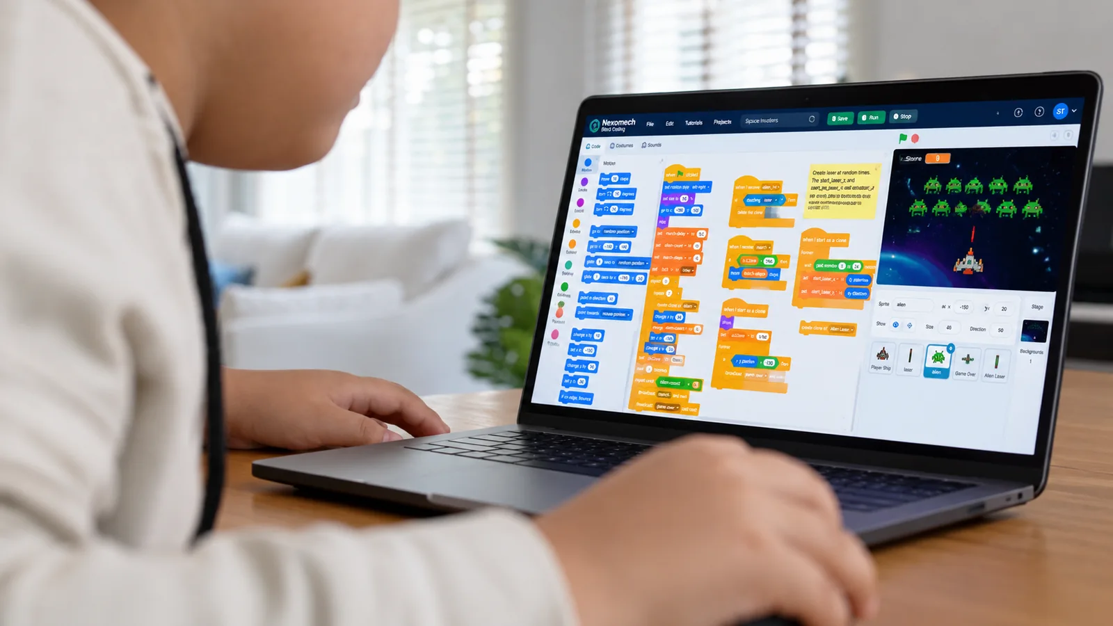 Student using Nexomech Block Coding on a laptop